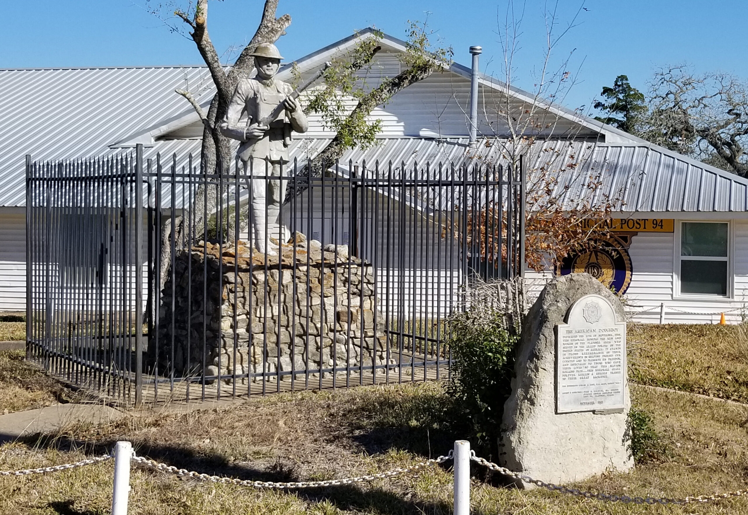 The American Doughboy Memorial in front of The American Legion Post 94 in Flatonia, Texas. The American Doughboy Memorial in front of The American Legion Post 94 in Flatonia, Texas.